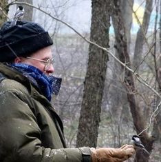 Ray L. Winstead December 2012 with chickadees